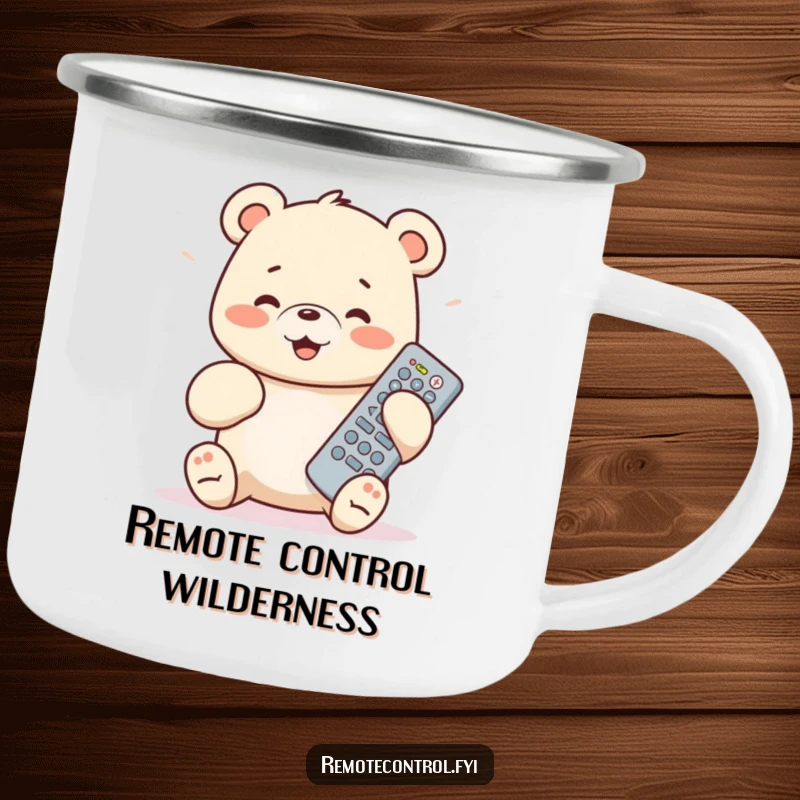 Funny bear cub camping mug: a cub clutching a remote, ready for outdoor fun and laughs.