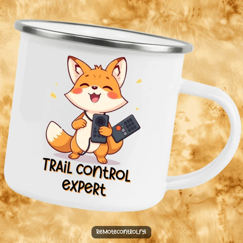 Funny camping mug with a happy fox character joyfully juggling two remote controls. Durable and amusing for outdoors.