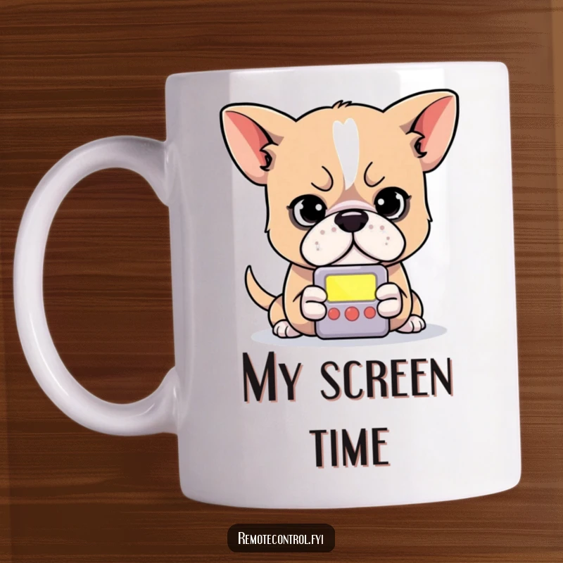 Funny dog mug showing a determined dog intensely focused on a small, glowing remote control screen.