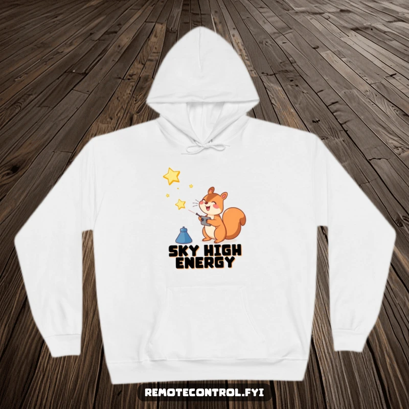 Funny Squirrel Hoodie: Joyful squirrel character operating a remote control to launch a shining star into the sky, embodying aspiration.