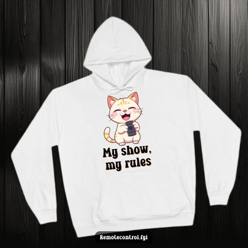 Funny hoodie of a giggling cat character holding a remote control, pointing it playfully, exuding relaxed command.
