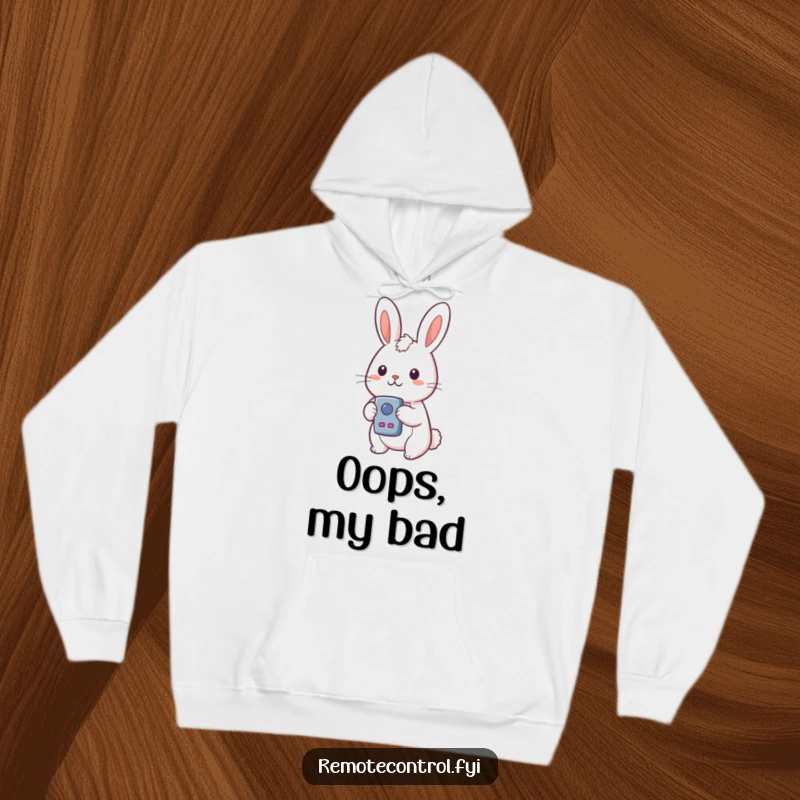Funny Kawaii Rabbit Hoodie depicting a rabbit with a look of surprise while holding a remote control with many buttons.