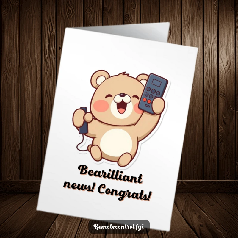 Funny free printable congratulations card showing a delighted bear holding a remote control upside down, celebrating success in a unique way.