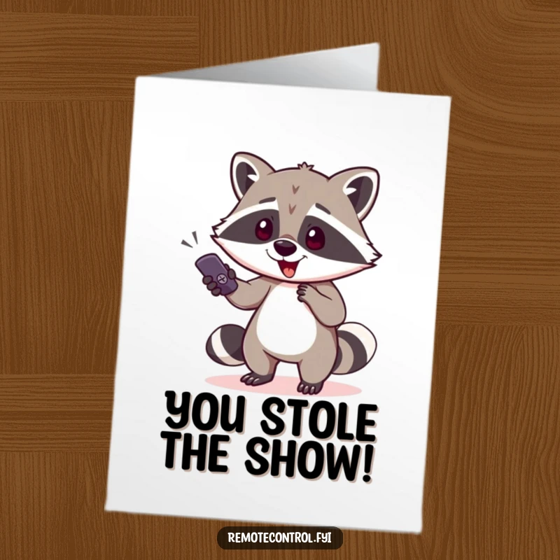 Funny Free Printable Congratulations Card: A sneaky raccoon character attempts to sneak away holding a stolen remote control.