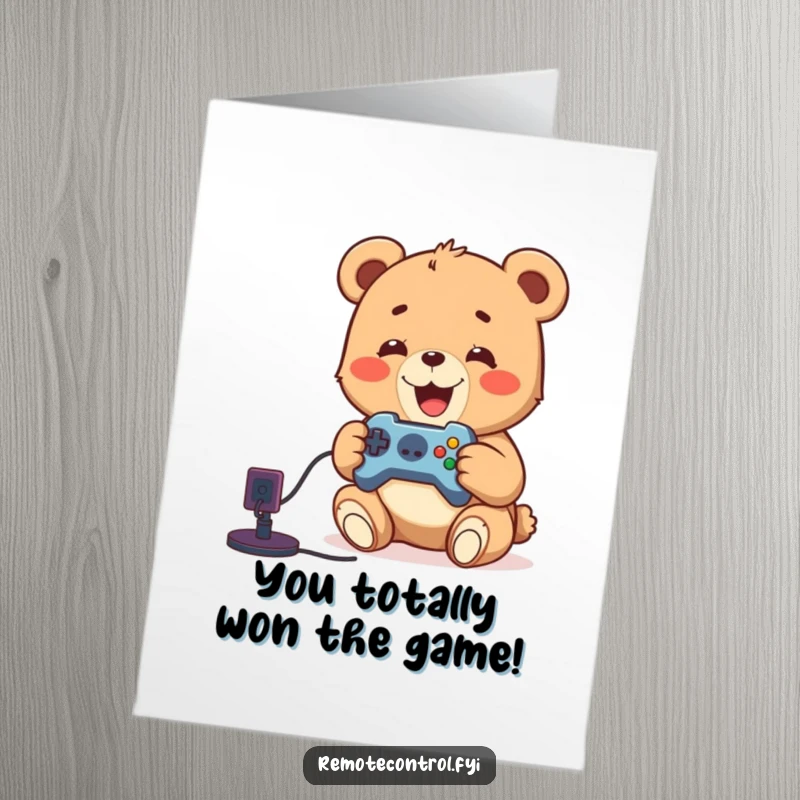 Funny Free Printable Congratulations Card: Joyful bear cub holding a remote, celebrating a video game win.