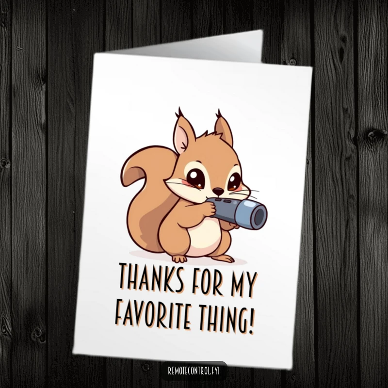 Funny Free Printable Thank You Card: A kawaii squirrel with mischievous eyes carefully aims a remote, offering thanks.