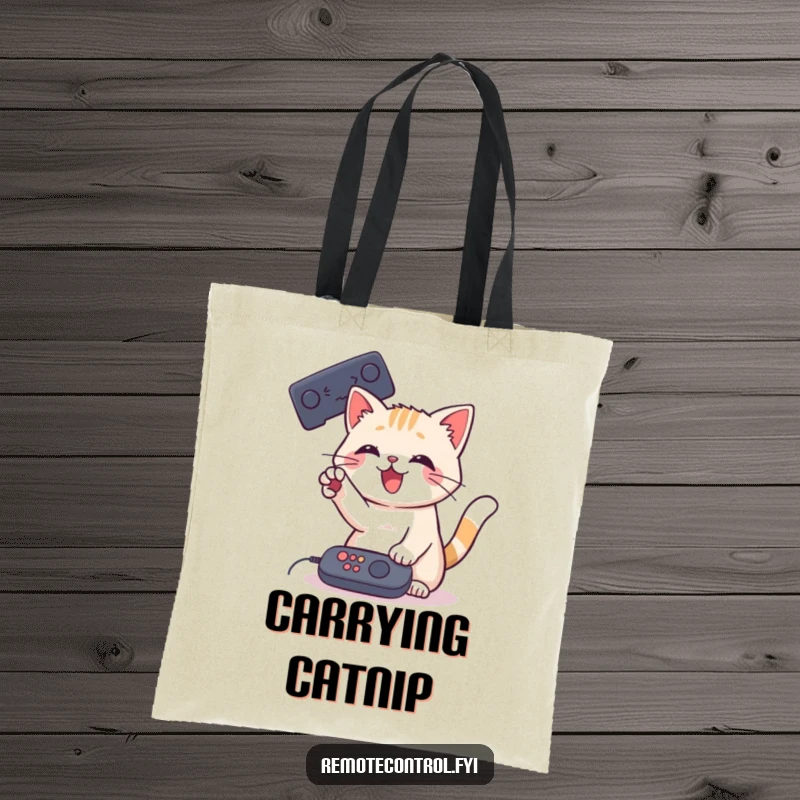 Funny Cat Remote Tote Bag featuring a playful cat batting at a remote control with its paw, ideal for daily use.