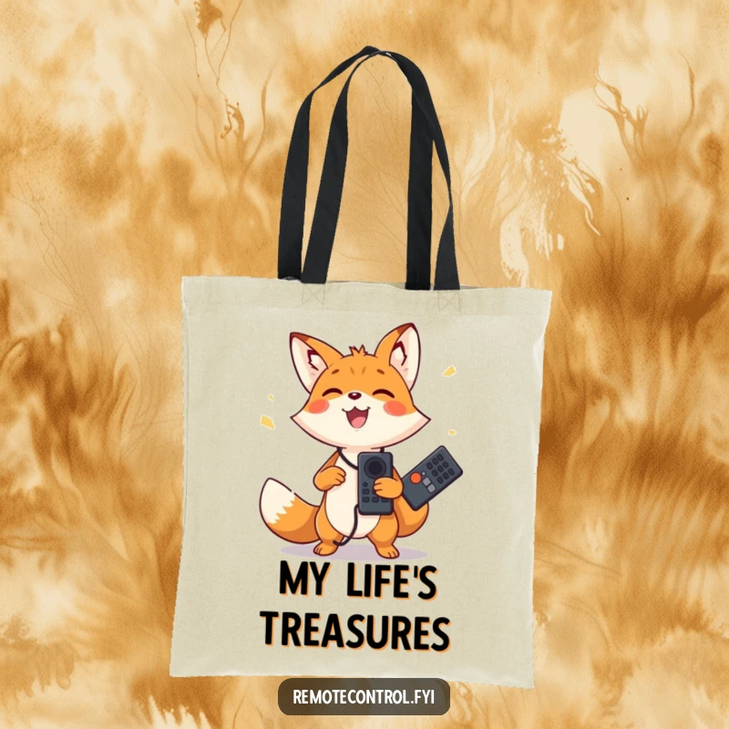Funny tote bag with a happy fox character joyfully juggling two remote controls. Practical and amusing.