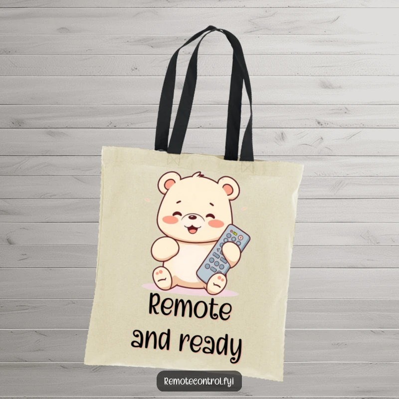 Funny bear cub tote bag depicting a cub ecstatically controlling a TV remote, ready for errands and laughs.